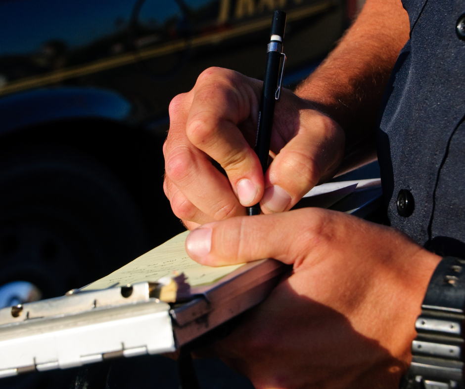 parking enforcement - officer writing citation